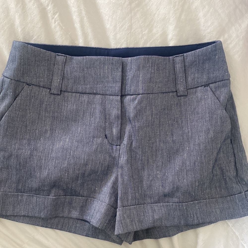 Express Midi mid-rise, stretch, dressy- like shorts. Size 4.